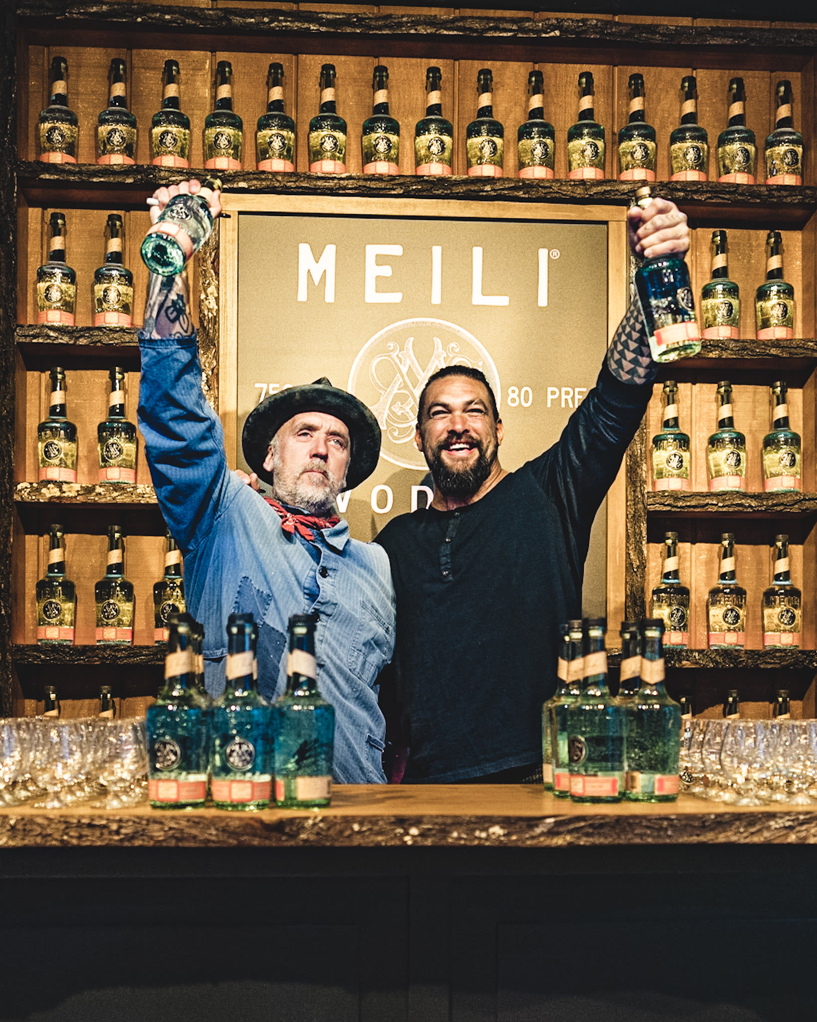 Jason Momoa and Blaine Halvorson behind the Meili bar
