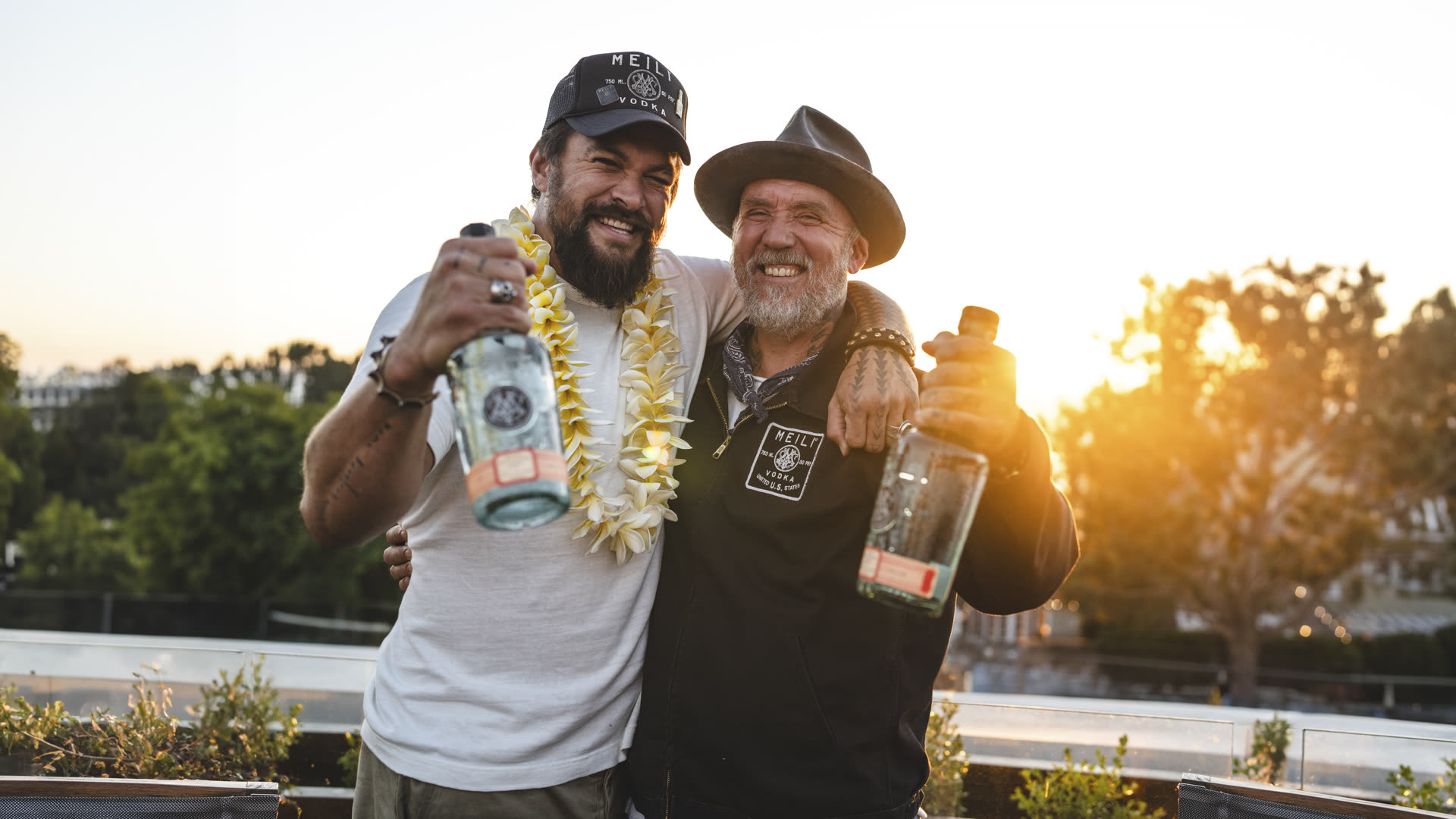 Jason Momoa and Blaine Halvorson with Meili Vodka at sunset